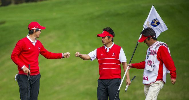 Ryo Ishikawa (L) and Hiroyuki Fujita secured a 3&2 success for Asia