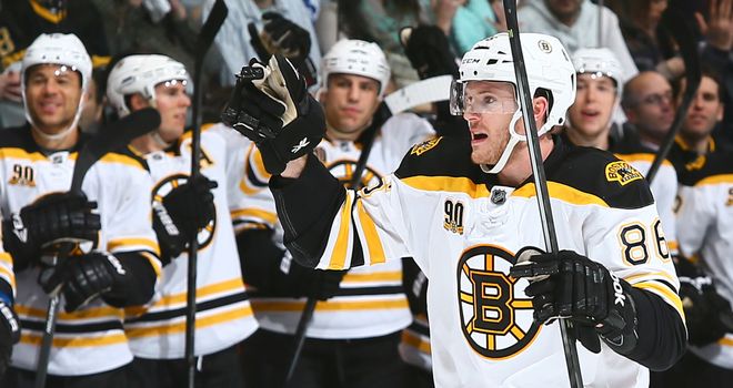 Kevan Miller celebrates his first goal in the NHL