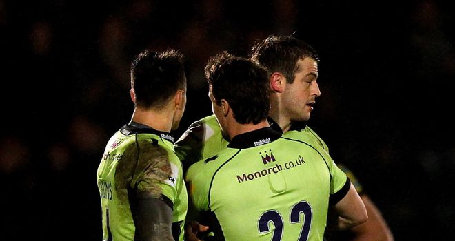 Stephen Myler is congratulated by team-mates after kicking the match-winning penalty