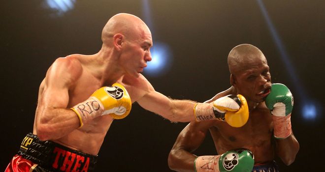 Stuart Hall (L): Won the vacant IBF bantamweight title in brutal contest