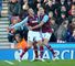 Jack Collison (l) and Andy Carroll: West Ham defender delighted to see striker return