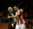 Mark Hughes: Celebrates with Marc Wilson at the final whistle