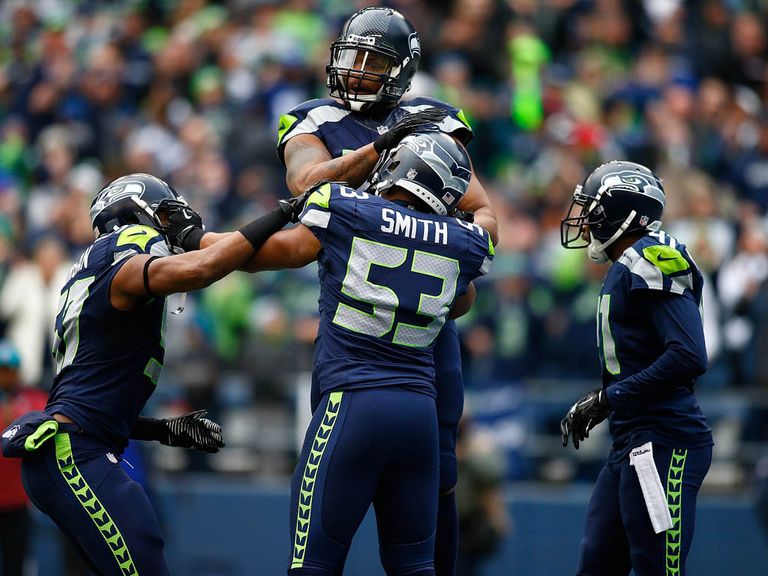 Malcolm Smith celebrates his touchdown
