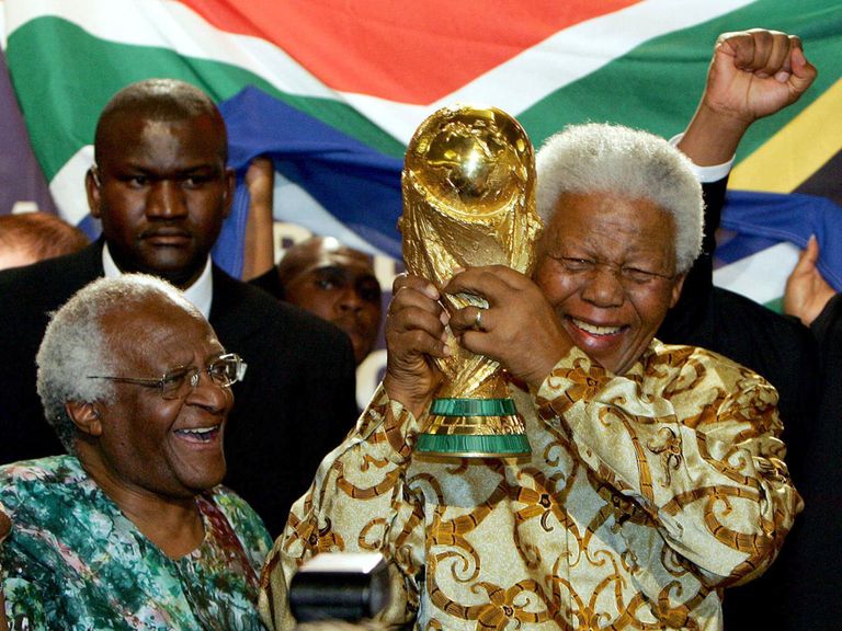 Nelson Mandela with the World Cup trophy.