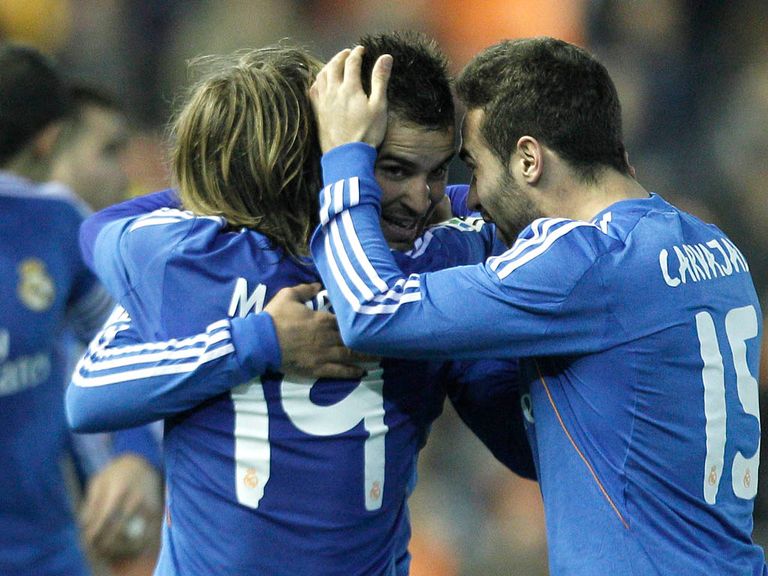 Real Madrid celebrate their dramatic win at Valencia