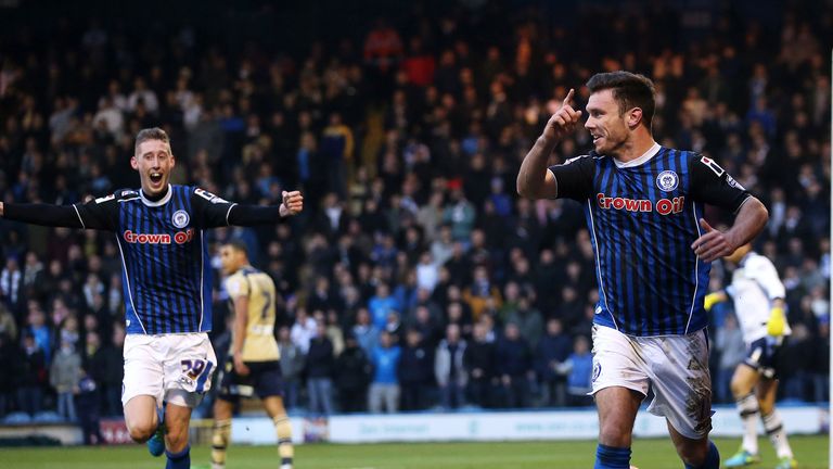 Scott Hogan: Celebrates putting Rochdale on their way to shock win