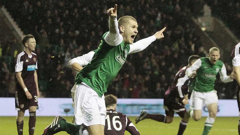 James Collins: Turns away after opening the scoring in the Edinburgh derby
