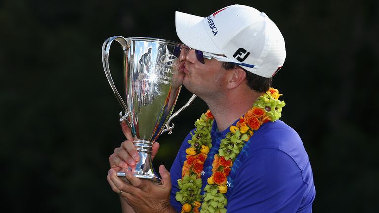 Zach Johnson: Kisses the trophy after winning the Hyundai Tournament of Champions
