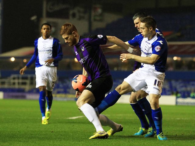 Matt Harrold keeps possession