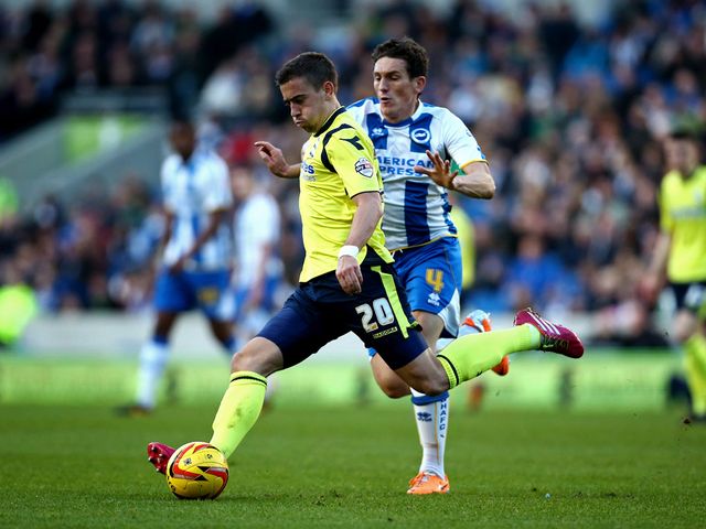 Billy Lee of Birmingham City takes the ball round Keith Andrews