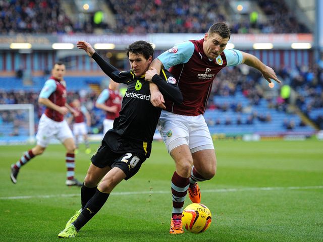 Sam Vokes powers away from Kieran Lee