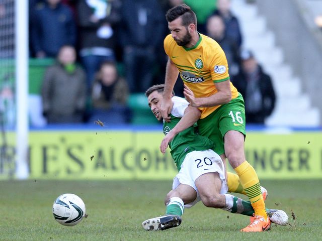 Joe Ledley is tackled by Tom Taiwo