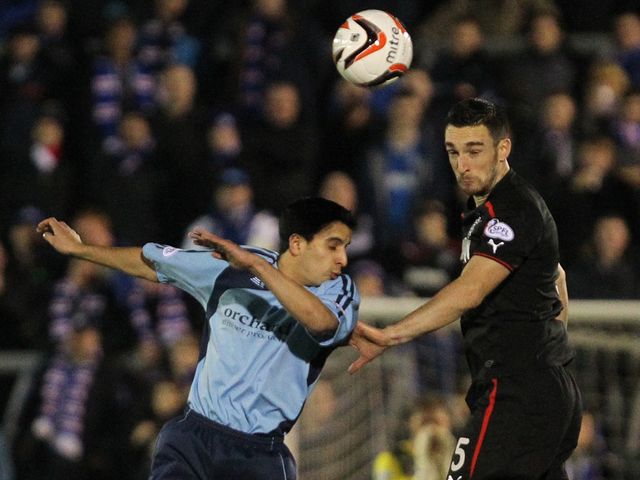 Rangers' Lee Wallace challenges Forfar's Omar Kader