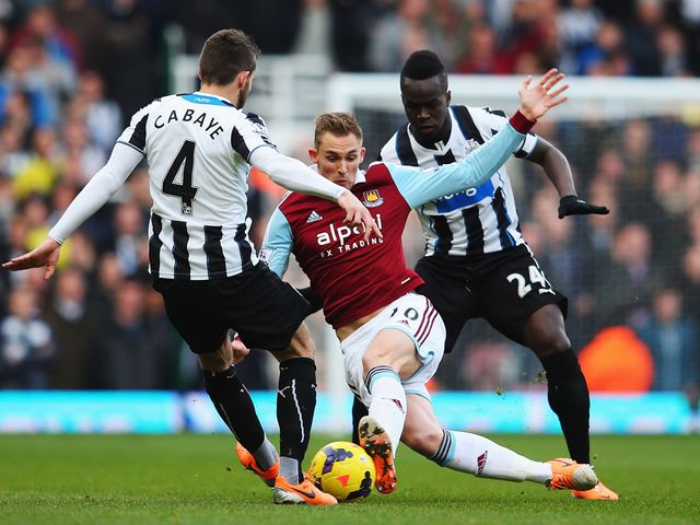 Jack Collison is put under pressure