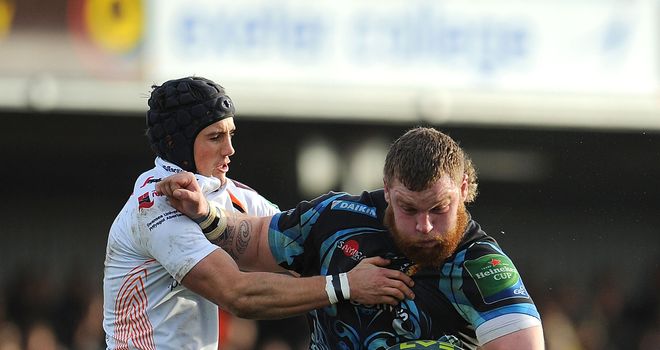 Exeter's Lloyd Fairbrother is tackled by Matthew Morgan