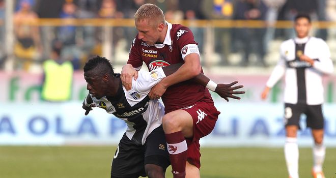 Acquah is put under pressure by Glik