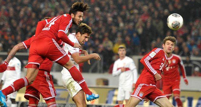 Bayern Munich's Claudio Pizarro scores with a header