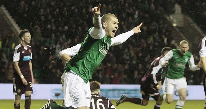 James Collins: Turns away after opening the scoring in the Edinburgh derby