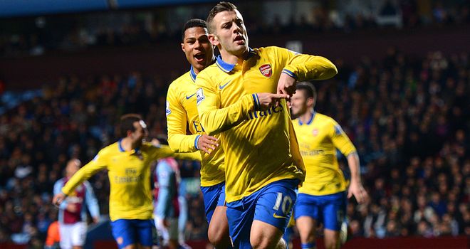 Jack Wilshere: Celebrates his opening goal with Serge Gnabry