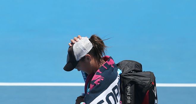 Heather Watson walks off after losing against Daniela Hantuchova