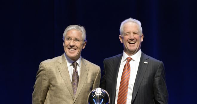 Pete Carroll and John Fox all smiles before Super Bowl
