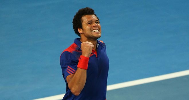 Jo-Wilfried Tsonga celebrates victory in the singles