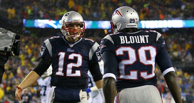 LeGarrette Blount of the New England Patriots celebrates with teammate Tom Brady