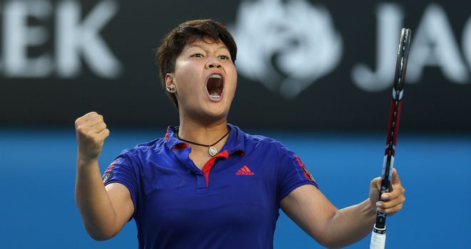 Luksika Kumkhum celebrates beating Petra Kvitova