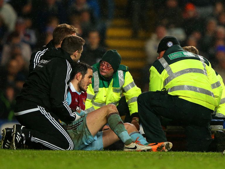 Joey O'Brien is tended to after dislocating his shoulder