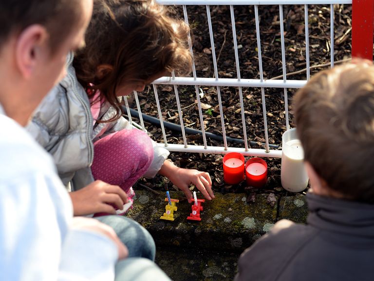 Fans leave their tributes at the Ferrari vigil