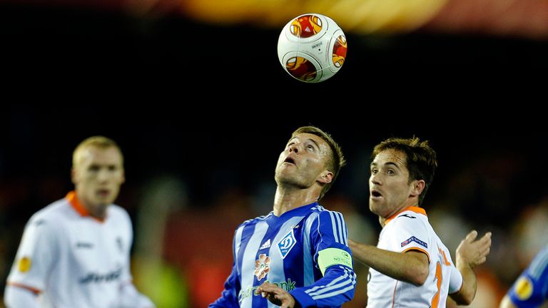 Andriy Yarmolenko (left) and Michel: Battle for the ball