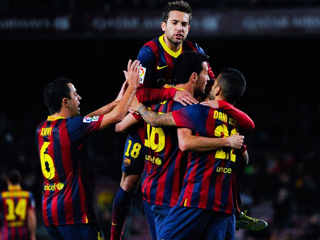 Sergio Busquets: Mobbed after scoring against Sociedad