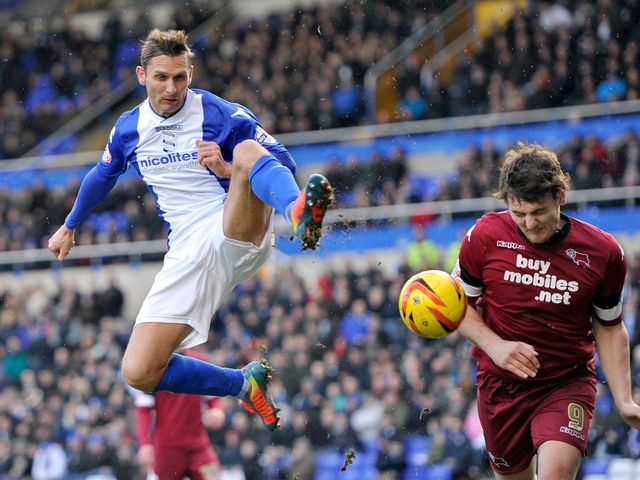 Birmingham's Peter Lovenkrands attempts a shot on goal