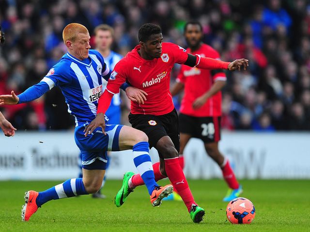Ben Watson challenges Wilfried Zaha