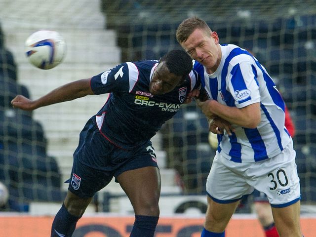 Kilmarnock's Lee Ashcroft battles with Jordan Slew