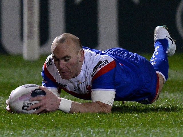 Luke Walsh goes in for a St Helens try