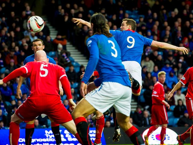 Rangers' Jon Daly scores the second goal of the game
