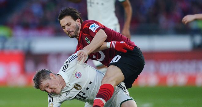 Bastian Schweinsteiger tumbles to the floor