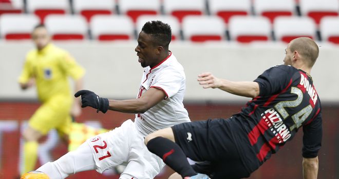 Julian Janvier and Mathieu Bodmer battle for the ball