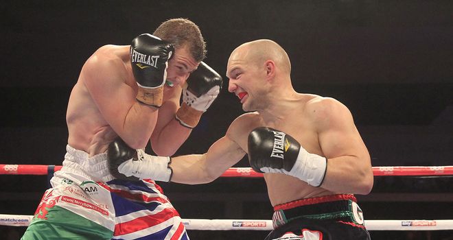 Gavin Rees lands a body shot early in his fight with Gary Buckland