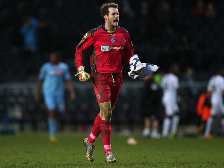 Tranmere goalkeeper Owain Williams celebrates victory