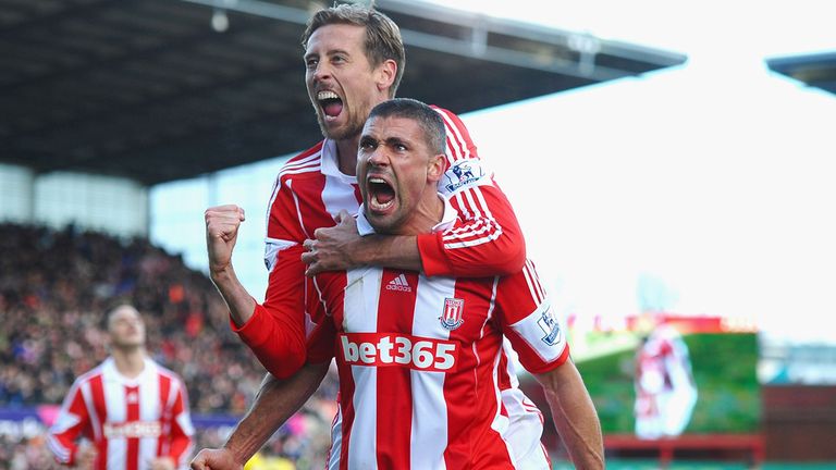Jon Walters and Peter Crouch celebrate the winning goal