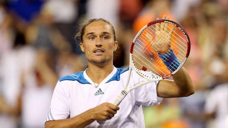 Alexandr Dolgopolov celebrates his win over Rafael Nadal