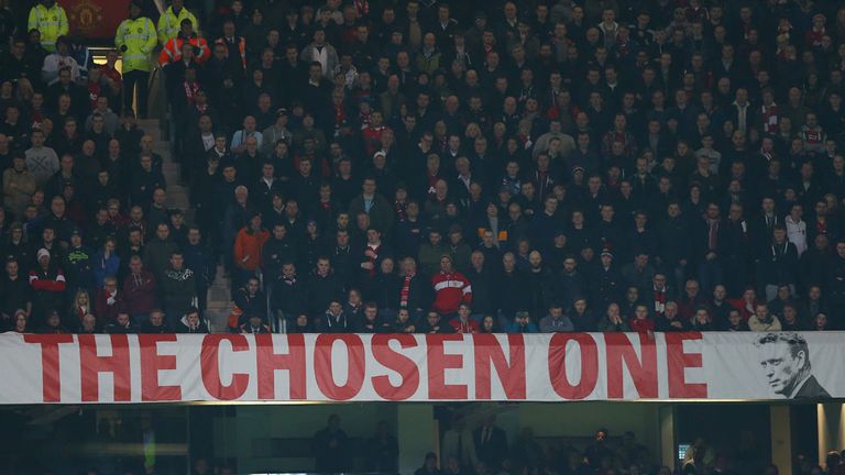 'The Chosen One' banner: Guarded by stewards during Manchester derby