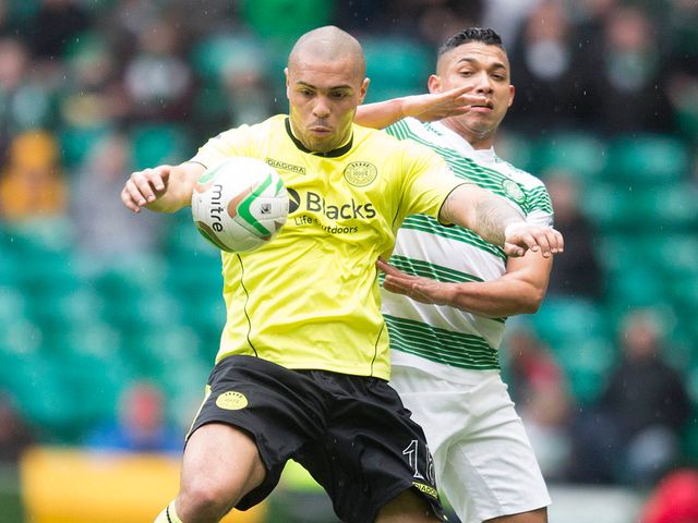 Josh Magennis stays ahead of Emillo Izaguirre