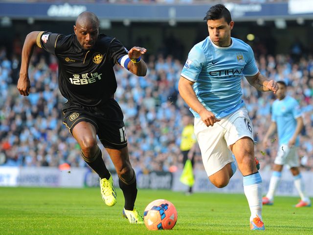 Sergio Aguero gets away from Emmerson Boyce