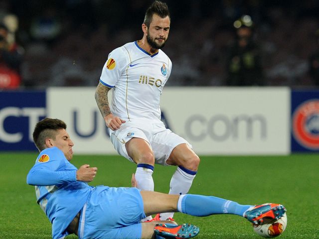 Federico Fernandez tackles Steven Defour