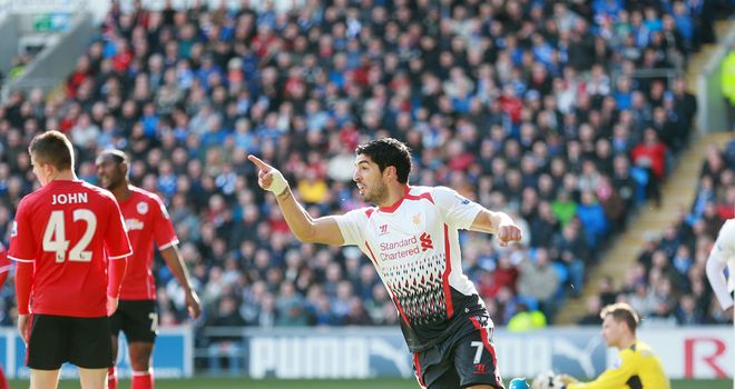 Luis Suarez: Celebrates against Cardiff City