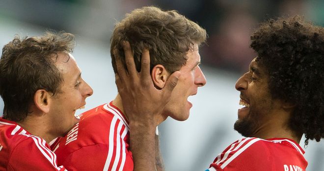 Thomas Mueller celebrates one of his three goals