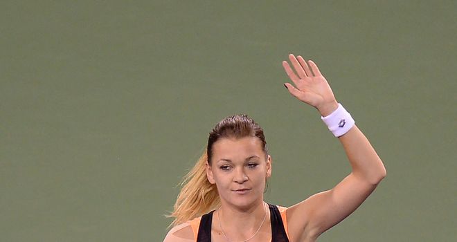 Agnieszka Radwanska celebrates her victory over Jelena Jankovic